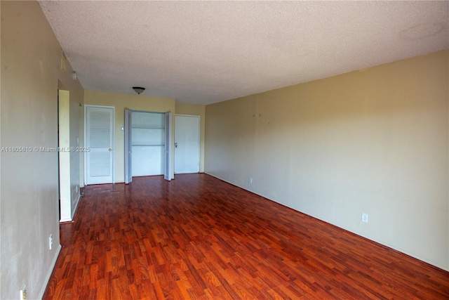 405 S Pine Island Rd Unit 405D, Plantation, FL 33324 - unfurnished room featuring wood finished floors and a textured ceiling