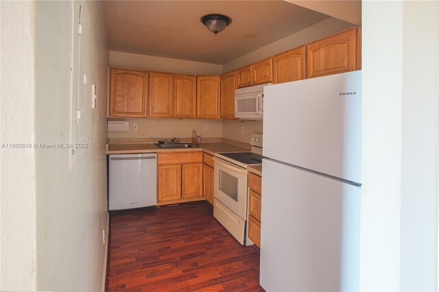 405 S Pine Island Rd Unit 405D, Plantation, FL 33324 - kitchen with white appliances, a sink, dark wood-type flooring, and light countertops
