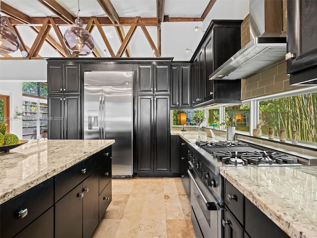 1519 Harrison St, Hollywood, FL 33020 - kitchen featuring stainless steel appliances, wall chimney range hood, tasteful backsplash, and plenty of natural light