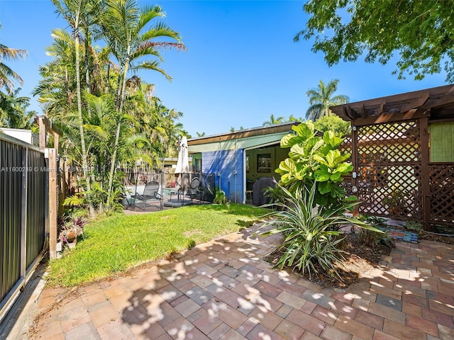 1519 Harrison St, Hollywood, FL 33020 - view of yard with a patio and a pergola