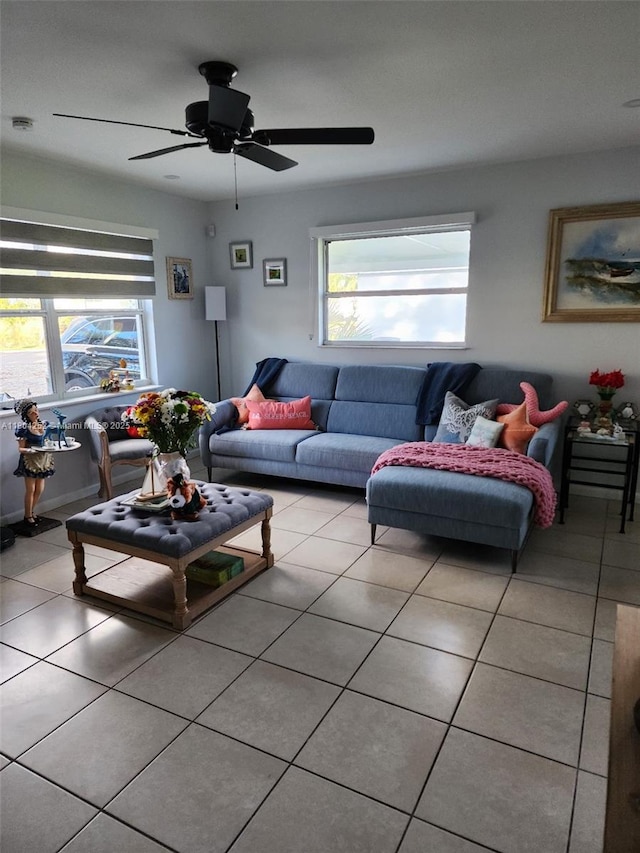 812 Lake Mcgregor Dr, Fort Myers, FL 33919 - living room with light tile patterned flooring, plenty of natural light, and a ceiling fan