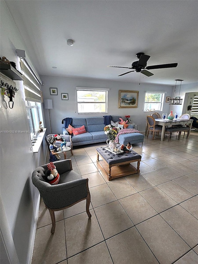 812 Lake Mcgregor Dr, Fort Myers, FL 33919 - tiled living area with a ceiling fan