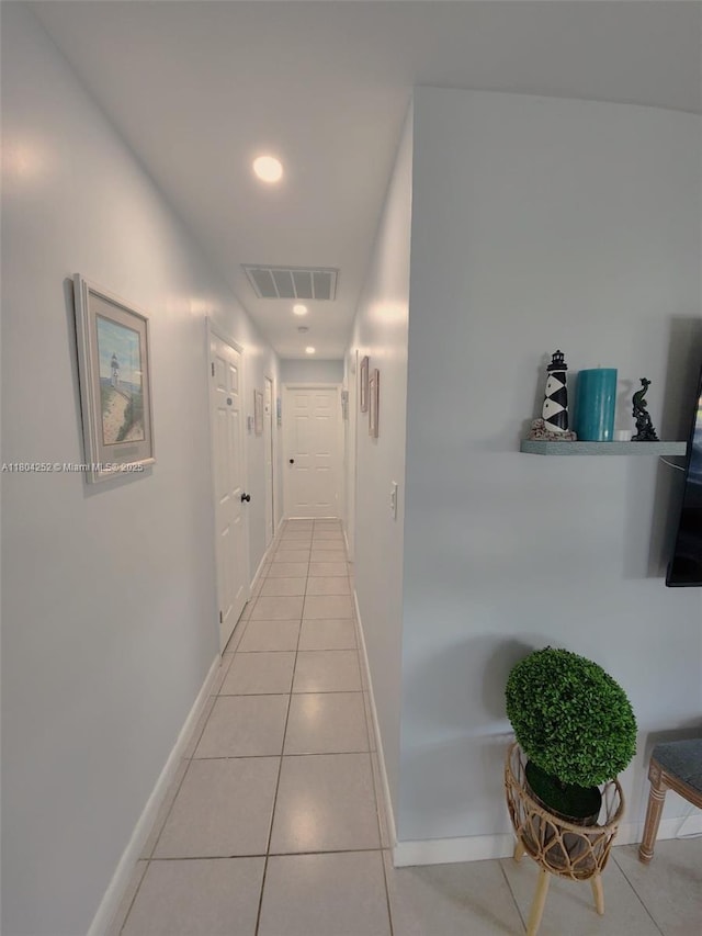 812 Lake Mcgregor Dr, Fort Myers, FL 33919 - corridor with light tile patterned floors, recessed lighting, and baseboards