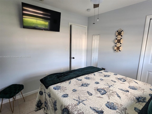 812 Lake Mcgregor Dr, Fort Myers, FL 33919 - bedroom with tile patterned flooring and baseboards