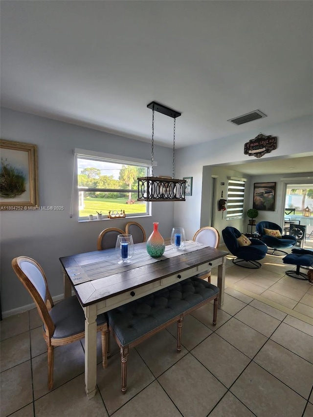 812 Lake Mcgregor Dr, Fort Myers, FL 33919 - tiled dining space featuring plenty of natural light