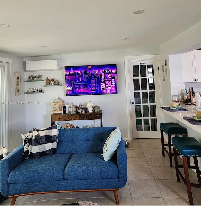 812 Lake Mcgregor Dr, Fort Myers, FL 33919 - living room with light tile patterned floors and a wall unit AC