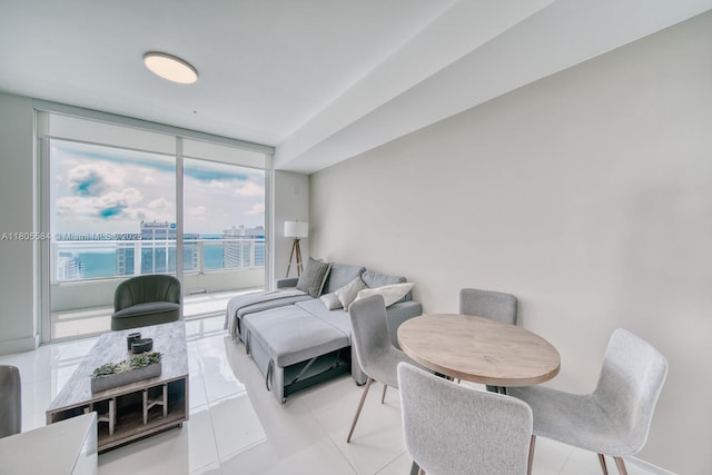 1080 Brickell Ave Unit 3802, Miami, FL 33131 - living room with light tile patterned flooring, floor to ceiling windows, and a water view