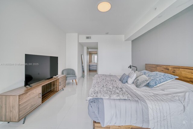 1080 Brickell Ave Unit 3802, Miami, FL 33131 - bedroom with light tile patterned flooring