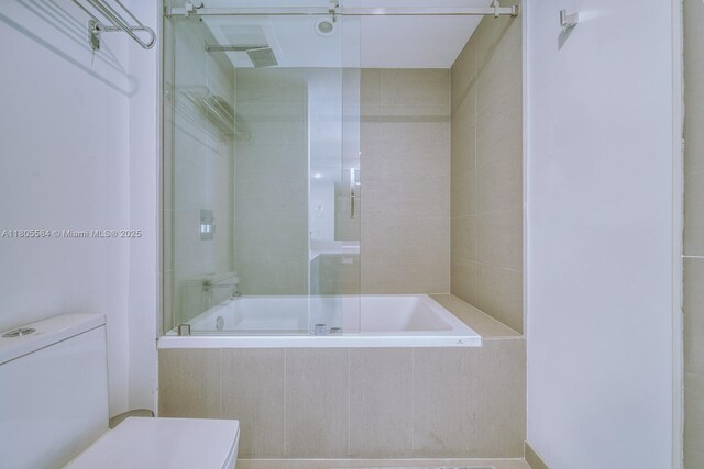 1080 Brickell Ave Unit 3802, Miami, FL 33131 - bathroom with toilet and tiled shower / bath