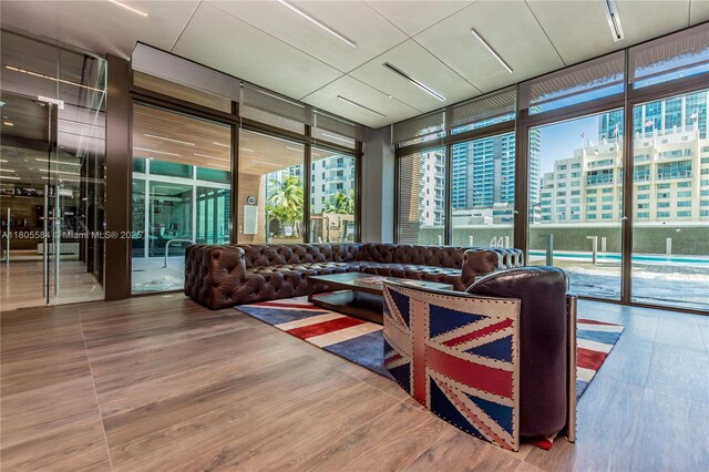 1080 Brickell Ave Unit 3802, Miami, FL 33131 - living area with a wall of windows and wood finished floors