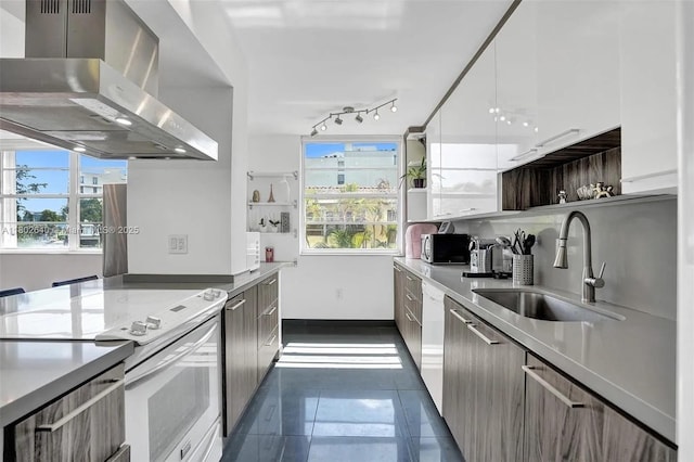 9180 W Bay Harbor Dr Unit 2C, Bay Harbor Islands, FL 33154 - kitchen with wall chimney exhaust hood, white appliances, and modern cabinets