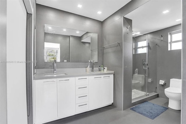 9180 W Bay Harbor Dr Unit 2C, Bay Harbor Islands, FL 33154 - bathroom featuring toilet, walk in shower, double vanity, concrete flooring, and healthy amount of natural light