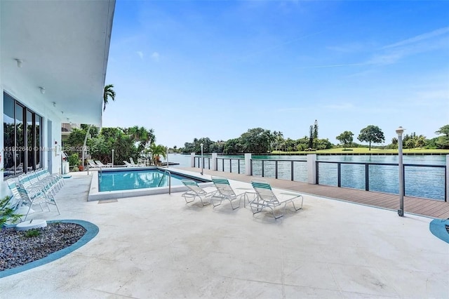 9180 W Bay Harbor Dr Unit 2C, Bay Harbor Islands, FL 33154 - community pool with a water view and a patio area