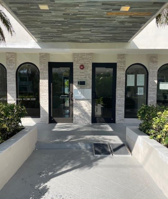 9180 W Bay Harbor Dr Unit 2C, Bay Harbor Islands, FL 33154 - entrance to property featuring stucco siding