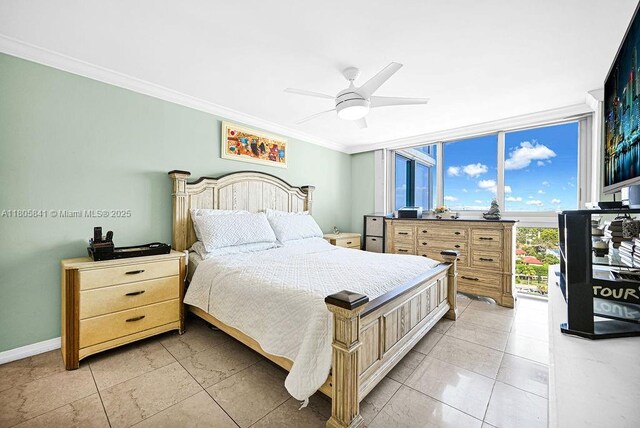 2655 Collins Ave Unit 1501, Miami Beach, FL 33140 - bedroom featuring ornamental molding, ceiling fan, baseboards, and floor to ceiling windows