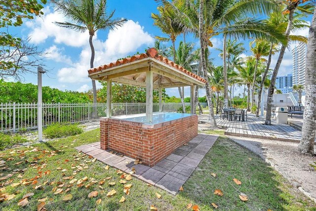 2655 Collins Ave Unit 1501, Miami Beach, FL 33140 - view of yard featuring a gazebo and a wooden deck