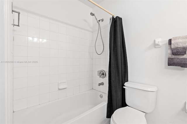 9808 NW 56th Pl, Coral Springs, FL 33076 - bathroom with toilet and shower / bath combo with shower curtain