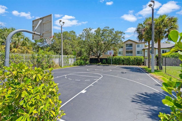 9808 NW 56th Pl, Coral Springs, FL 33076 - view of sport court featuring community basketball court and fence