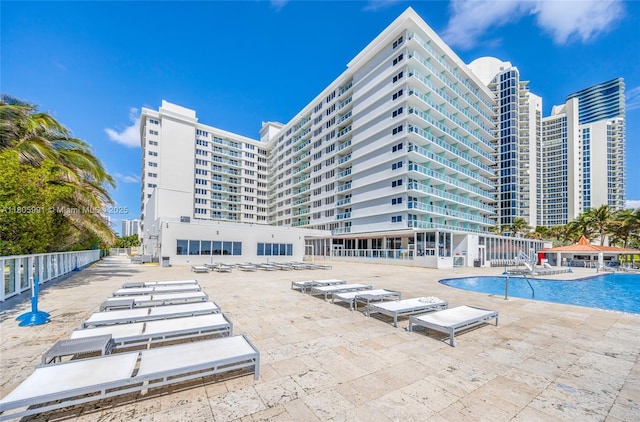 19201 Collins Ave Unit 721, Sunny Isles Beach, FL 33160 - community pool featuring a patio area