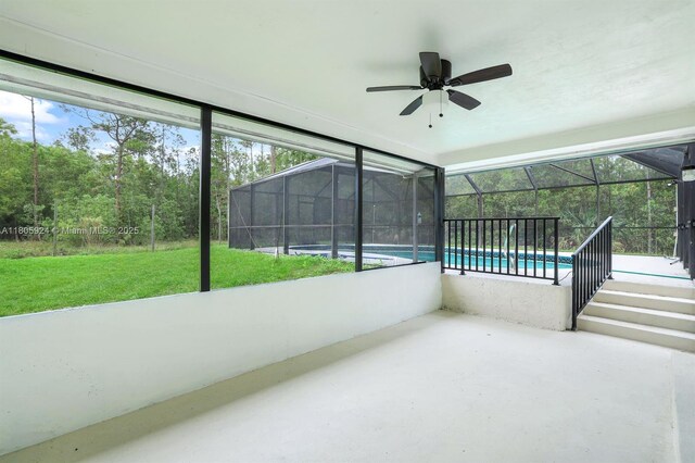 3973 4th Ave SE, Naples, FL 34117 - unfurnished sunroom featuring a ceiling fan