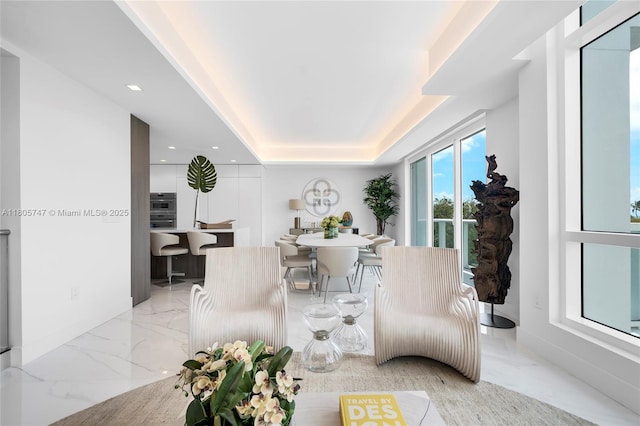 100 S Pointe Dr Unit Th-13, Miami Beach, FL 33139 - living area with marble tiled flooring, a tray ceiling, and recessed lighting