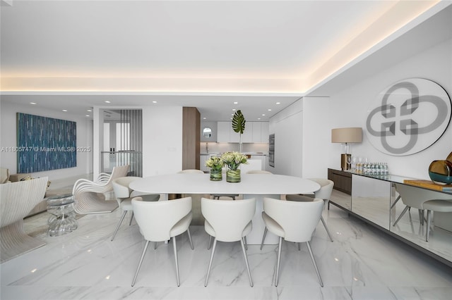 100 S Pointe Dr Unit Th-13, Miami Beach, FL 33139 - dining room with light marble finish floors and recessed lighting
