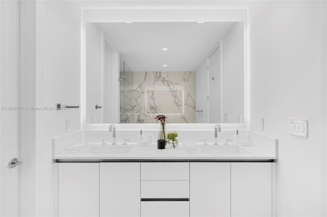 100 S Pointe Dr Unit Th-13, Miami Beach, FL 33139 - full bathroom featuring double vanity and a marble finish shower