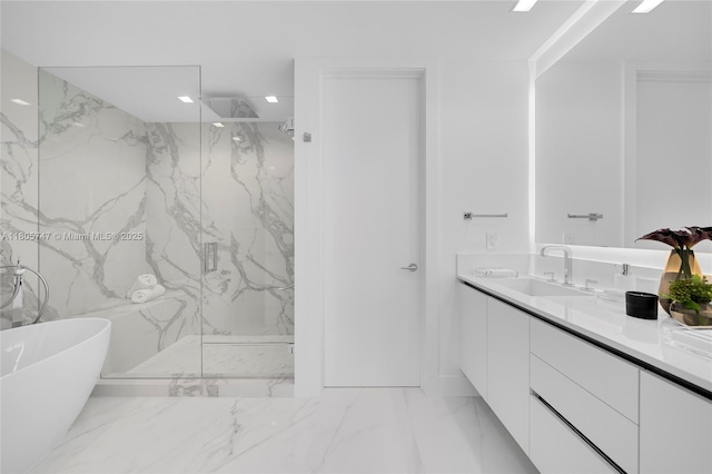 100 S Pointe Dr Unit Th-13, Miami Beach, FL 33139 - full bathroom with double vanity, a marble finish shower, a soaking tub, and marble tiled floors