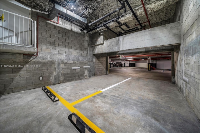 100 S Pointe Dr Unit Th-13, Miami Beach, FL 33139 - parking garage featuring concrete block wall