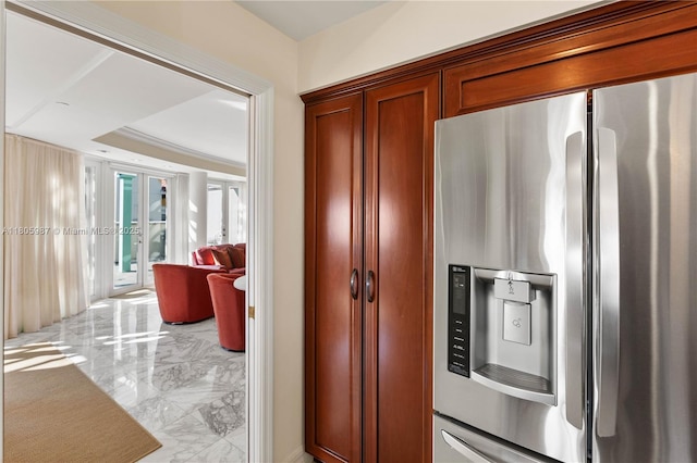 610 Valencia Ave Unit 503, Coral Gables, FL 33134 - kitchen featuring stainless steel fridge, french doors, light marble finish flooring, and brown cabinets