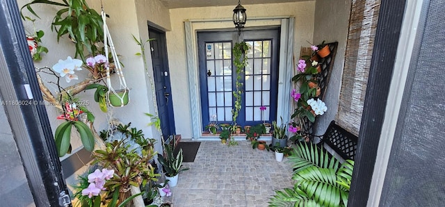 15545 SW 110th Ter, Miami, FL 33196 - property entrance featuring french doors and stucco siding