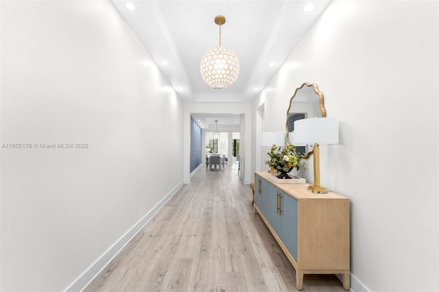 622 Malaga Ave Unit 622, Coral Gables, FL 33134 - hall with a chandelier, recessed lighting, baseboards, and light wood finished floors