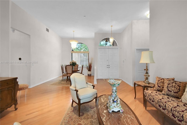 2701 Edgewater Ct, Weston, FL 33332 - living room featuring light wood finished floors and baseboards