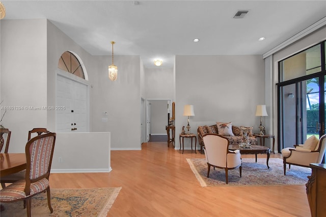 2701 Edgewater Ct, Weston, FL 33332 - living room featuring light wood-style flooring, baseboards, and recessed lighting
