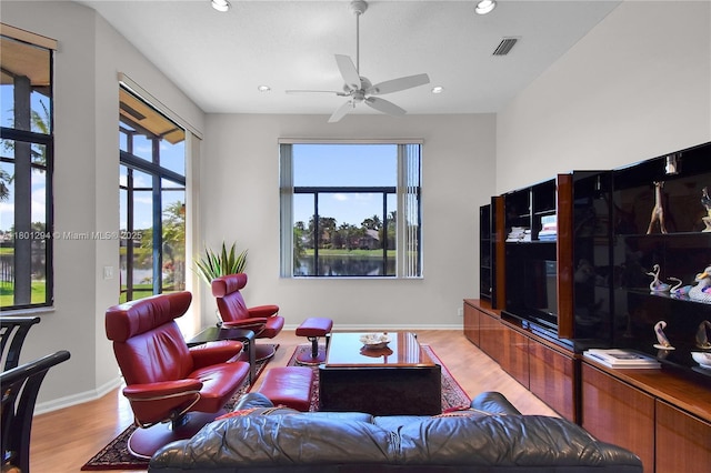 2701 Edgewater Ct, Weston, FL 33332 - living area with a ceiling fan, recessed lighting, light wood-type flooring, and baseboards
