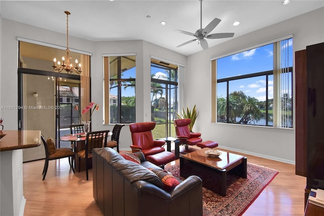 2701 Edgewater Ct, Weston, FL 33332 - living room featuring light wood-type flooring, a chandelier, recessed lighting, a ceiling fan, and baseboards