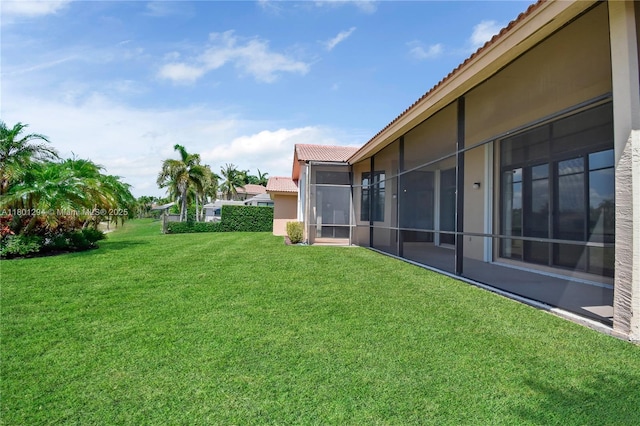 2701 Edgewater Ct, Weston, FL 33332 - view of grassy yard with a sunroom