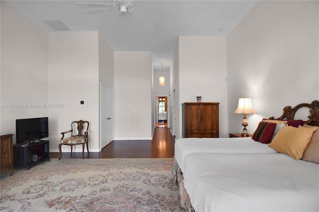 2701 Edgewater Ct, Weston, FL 33332 - bedroom featuring wood finished floors, a ceiling fan, and baseboards