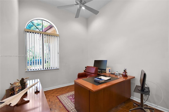 2701 Edgewater Ct, Weston, FL 33332 - office with a ceiling fan, baseboards, and a towering ceiling