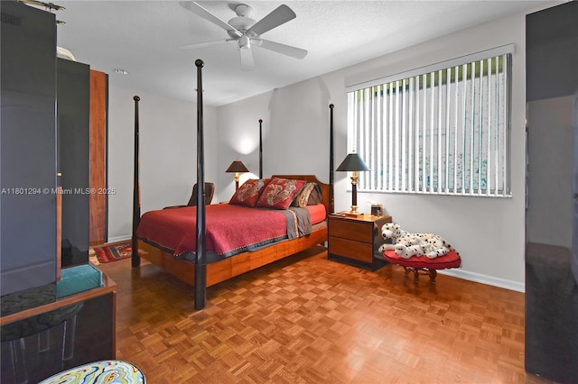 2701 Edgewater Ct, Weston, FL 33332 - bedroom with baseboards, ceiling fan, and a textured ceiling