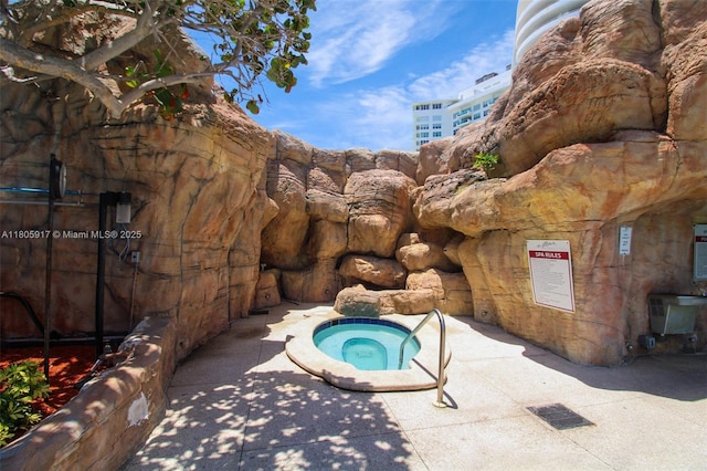 5225 Collins Ave Unit 1409, Miami Beach, FL 33140 - view of pool featuring a hot tub