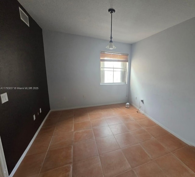 6520 NW 114th Ave Unit 1637, Doral, FL 33178 - tiled spare room with baseboards