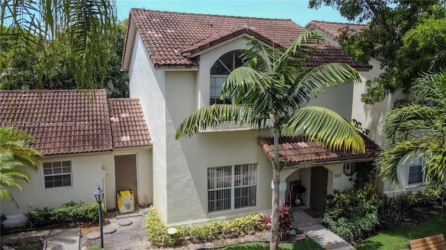 805 NW 108th Ter Unit 7L5, Pembroke Pines, FL 33026 - mediterranean / spanish house featuring a tile roof and stucco siding