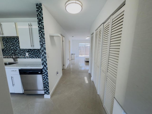805 NW 108th Ter Unit 7L5, Pembroke Pines, FL 33026 - hall with light tile patterned floors, a sink, and baseboards