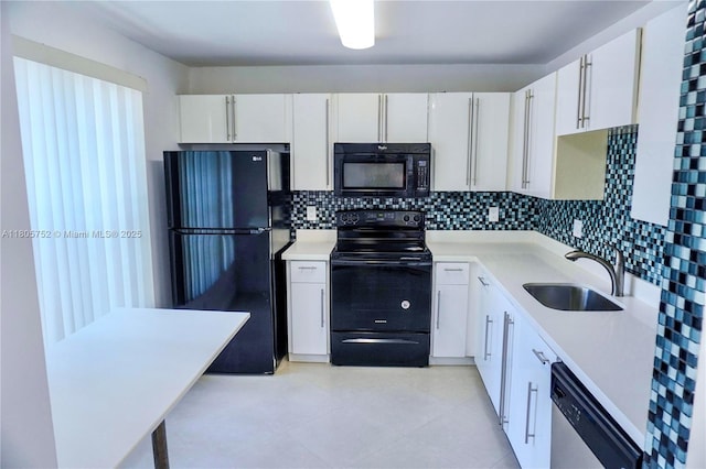 805 NW 108th Ter Unit 7L5, Pembroke Pines, FL 33026 - kitchen featuring black appliances, a sink, tasteful backsplash, and white cabinetry