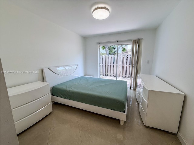 805 NW 108th Ter Unit 7L5, Pembroke Pines, FL 33026 - tiled bedroom with access to exterior