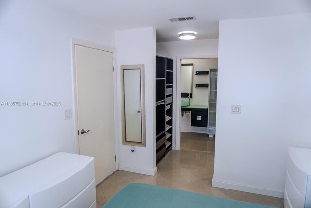 805 NW 108th Ter Unit 7L5, Pembroke Pines, FL 33026 - full bathroom featuring tile patterned flooring and baseboards