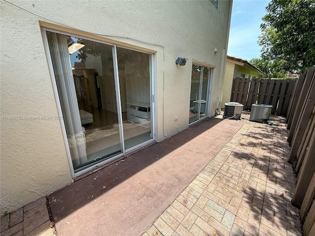 805 NW 108th Ter Unit 7L5, Pembroke Pines, FL 33026 - view of patio / terrace with central AC