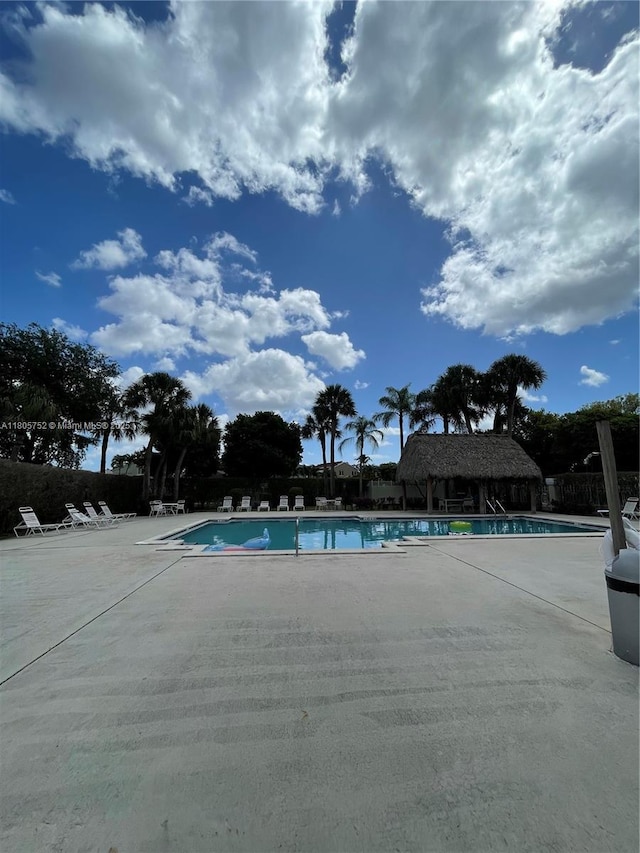 805 NW 108th Ter Unit 7L5, Pembroke Pines, FL 33026 - community pool featuring a patio area