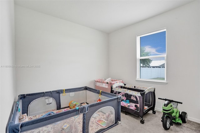 434 SW Namoit Pl, Port St Lucie, FL 34953 - recreation room featuring carpet and baseboards